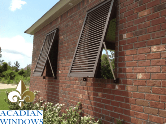 An example of hurricane shutters Metairie residents trust, installed by Acadian Windows on a local home
