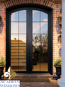 We provide the exterior and entry doors Pensacola homeowners love, like this stunning black door with glass panels