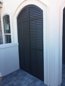 One of the colonial hurricane shutters near Bay St. Louis installed by Acadian Windows.
