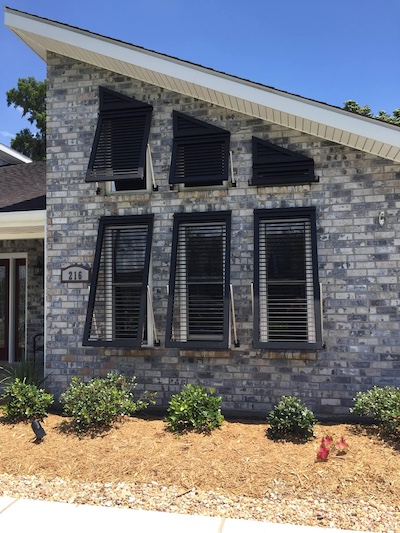 We fit our hurricane shutters to Pensacola homes with all sizes of windows, as seen in this customer example with unique window sizes and shapes